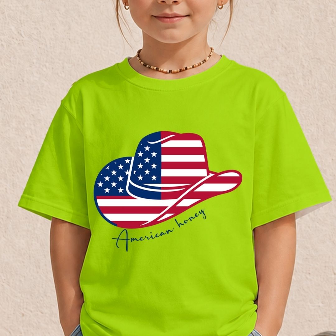A young child wearing a vibrant lime green t-shirt featuring the colorful patriotic cowboy hat graphic on the front.