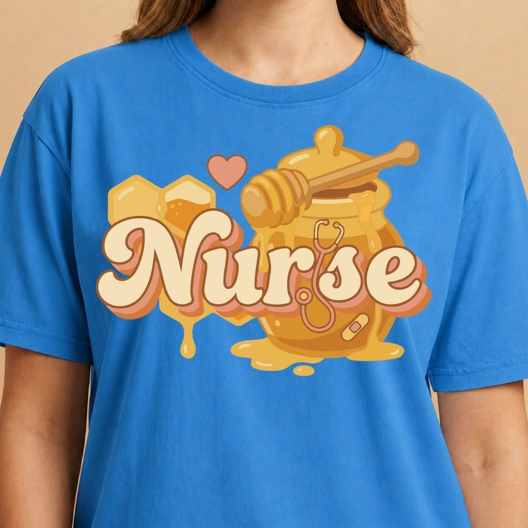 Blue t-shirt with 'Nurse' design featuring honeycomb and stethoscope on a beige background