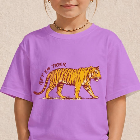 A child wearing a purple short-sleeve t-shirt with a graphic of a walking tiger and the text 'GET EM TIGER' in red, set against a textured beige wall.