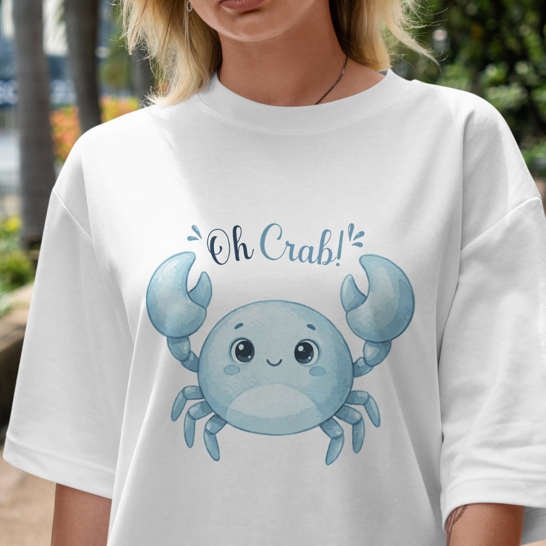 Person wearing a white t-shirt with a blue crab graphic and 'Oh Crab!' text.