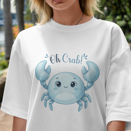 Person wearing a white t-shirt with a blue crab graphic and 'Oh Crab!' text.