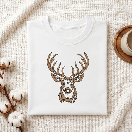  Folded white cotton t-shirt mockup featuring a deer head machine embroidery design, styled with cotton stems and a wooden cup   