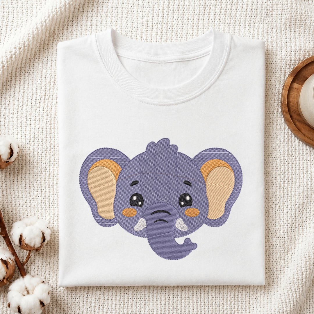 White t-shirt with a purple elephant design on a textured surface
