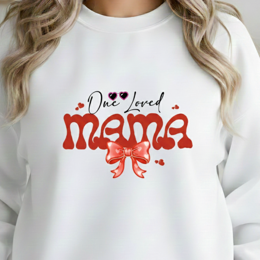 White sweatshirt with 'One Loved Mama' text and red bow graphic