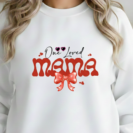 White sweatshirt with 'One Loved Mama' text and red bow graphic