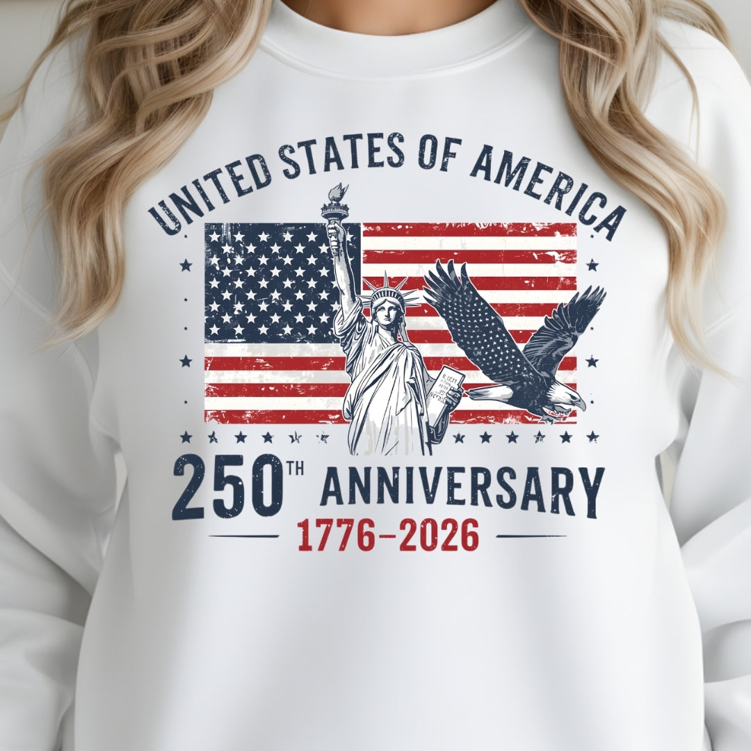 White sweatshirt with 'United States of America 250th Anniversary' design featuring the Statue of Liberty and an eagle.