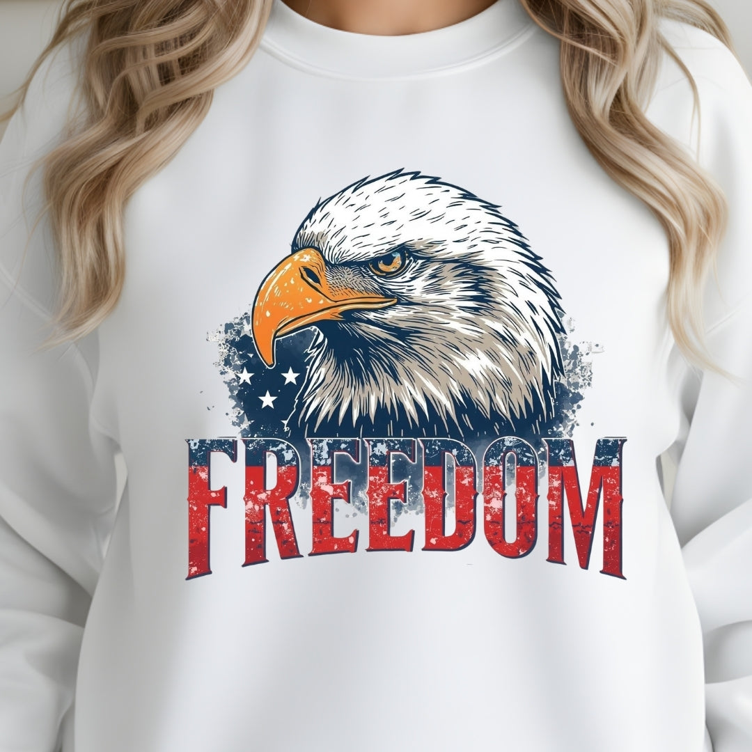 White sweatshirt with a bald eagle graphic and 'FREEDOM' text on a white background