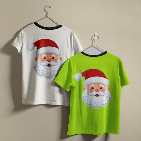 Two children's short-sleeve ringer T-shirts hanging on hangers against a plain beige wall. One shirt is white with a black collar and features a large Santa Claus face graphic on the front.