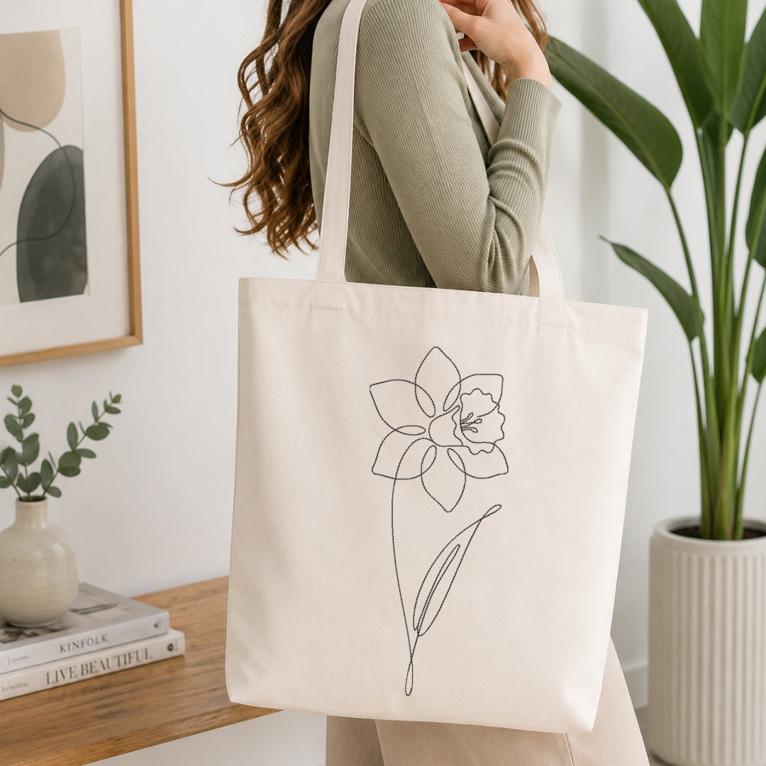 Canvas tote bag mockup with floral embroidery artwork