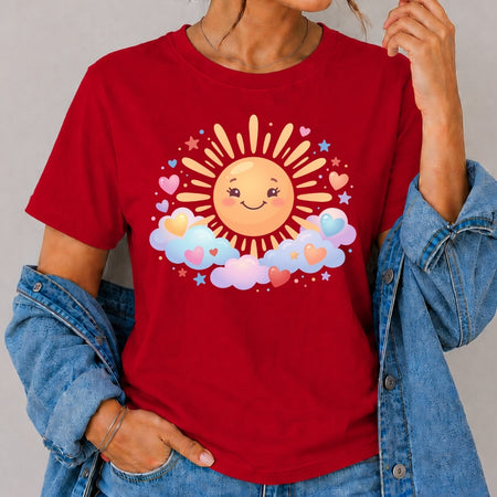Red t-shirt with a sun and cloud design worn by a person against a gray background