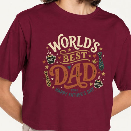 Maroon t-shirt with 'World's Best Dad' text and graphics on a plain background