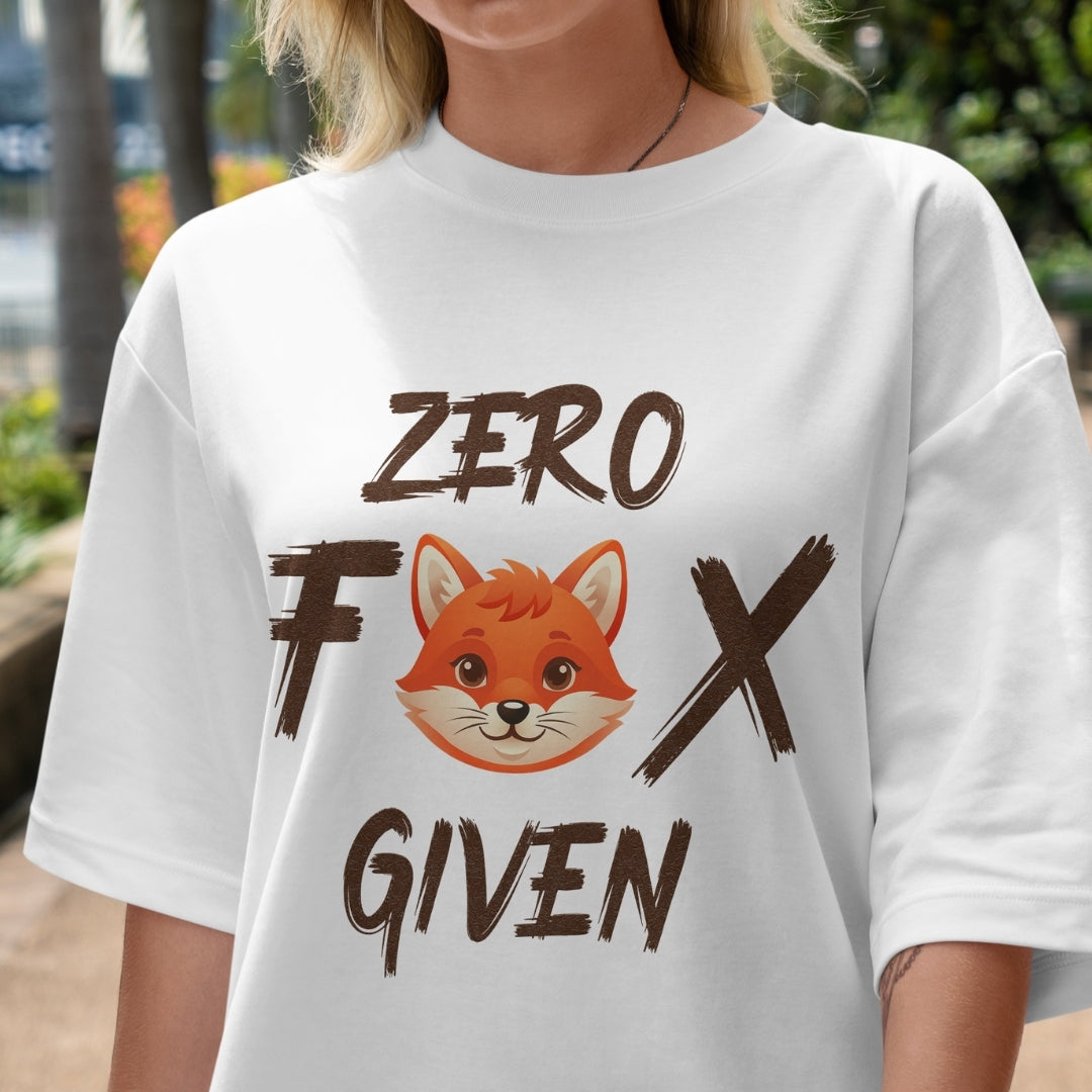 White t-shirt with a fox graphic and text 'ZERO FOX GIVEN' worn by a person outdoors.