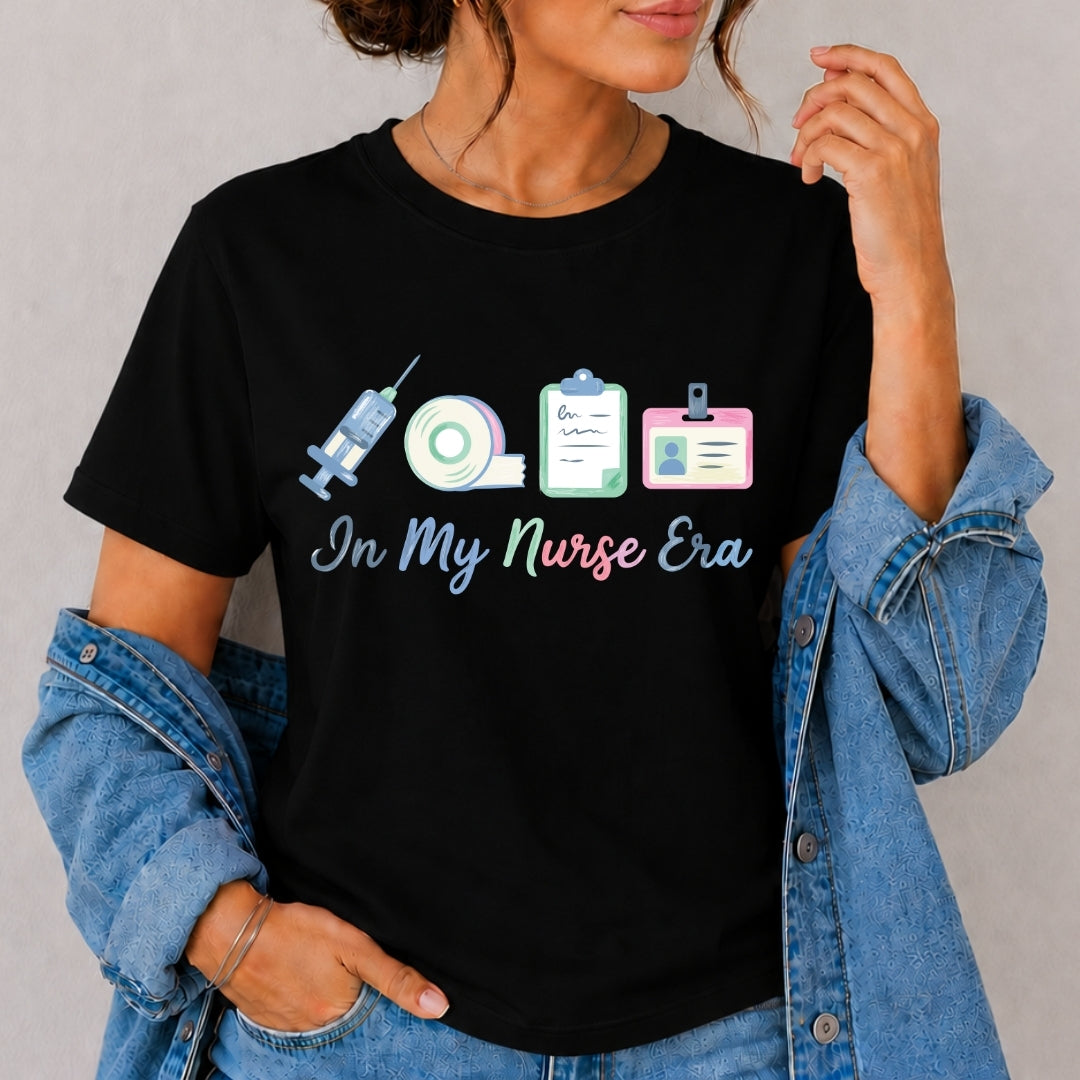 Person wearing a black t-shirt with nurse-themed graphics and text.