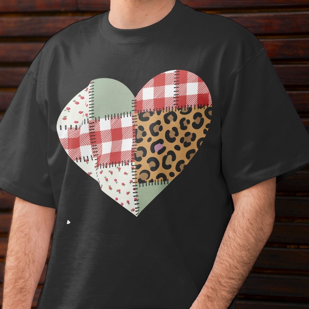 Black t-shirt with a colorful heart design on a wooden background