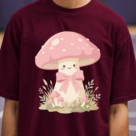 Maroon t-shirt with a cartoon mushroom design featuring a pink bow.