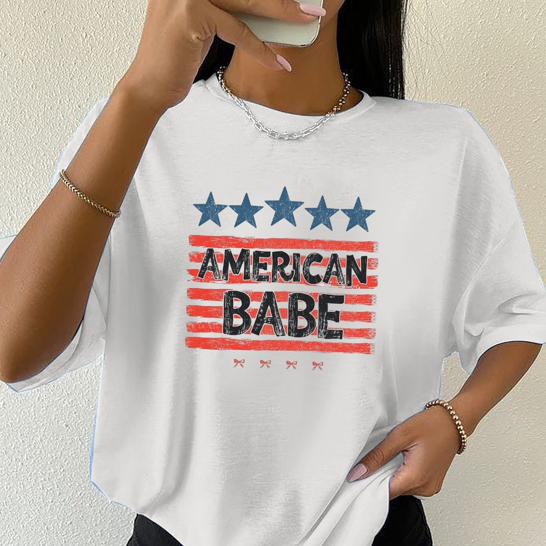 Person wearing a white t-shirt with 'American Babe' graphic design.