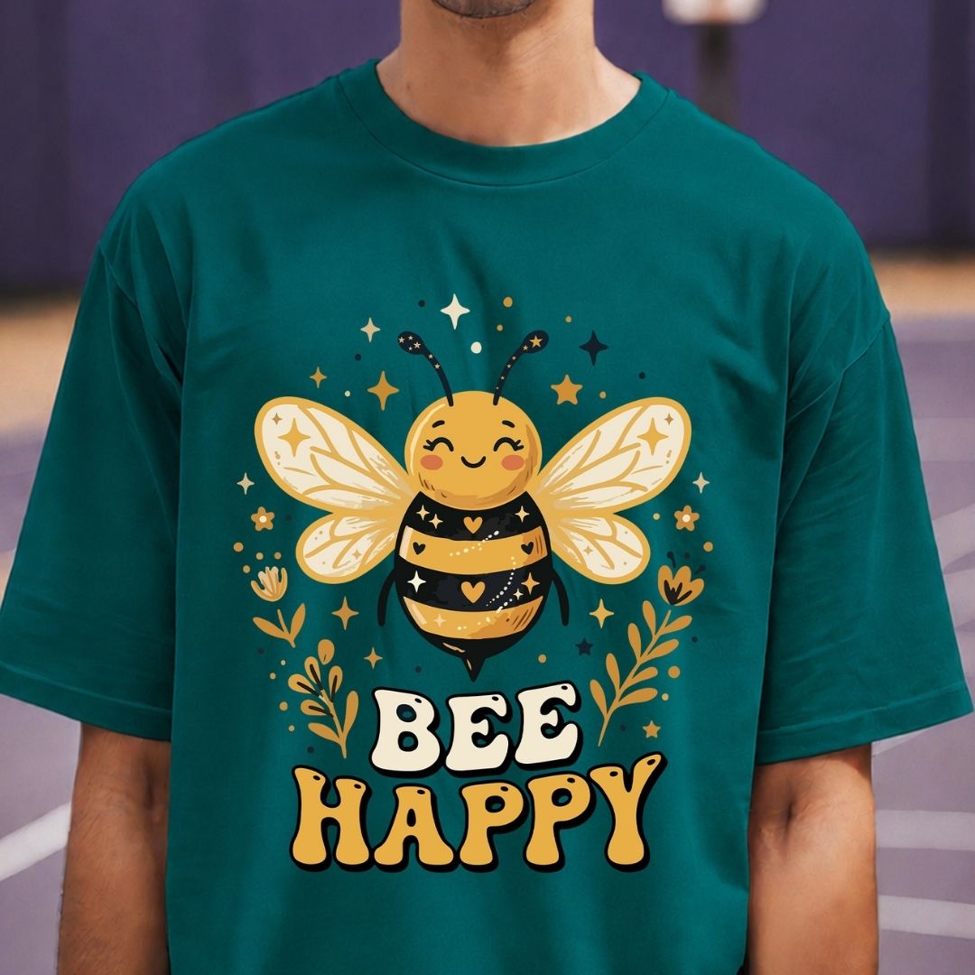 Person wearing a teal t-shirt with a bee graphic and 'Bee Happy' text.