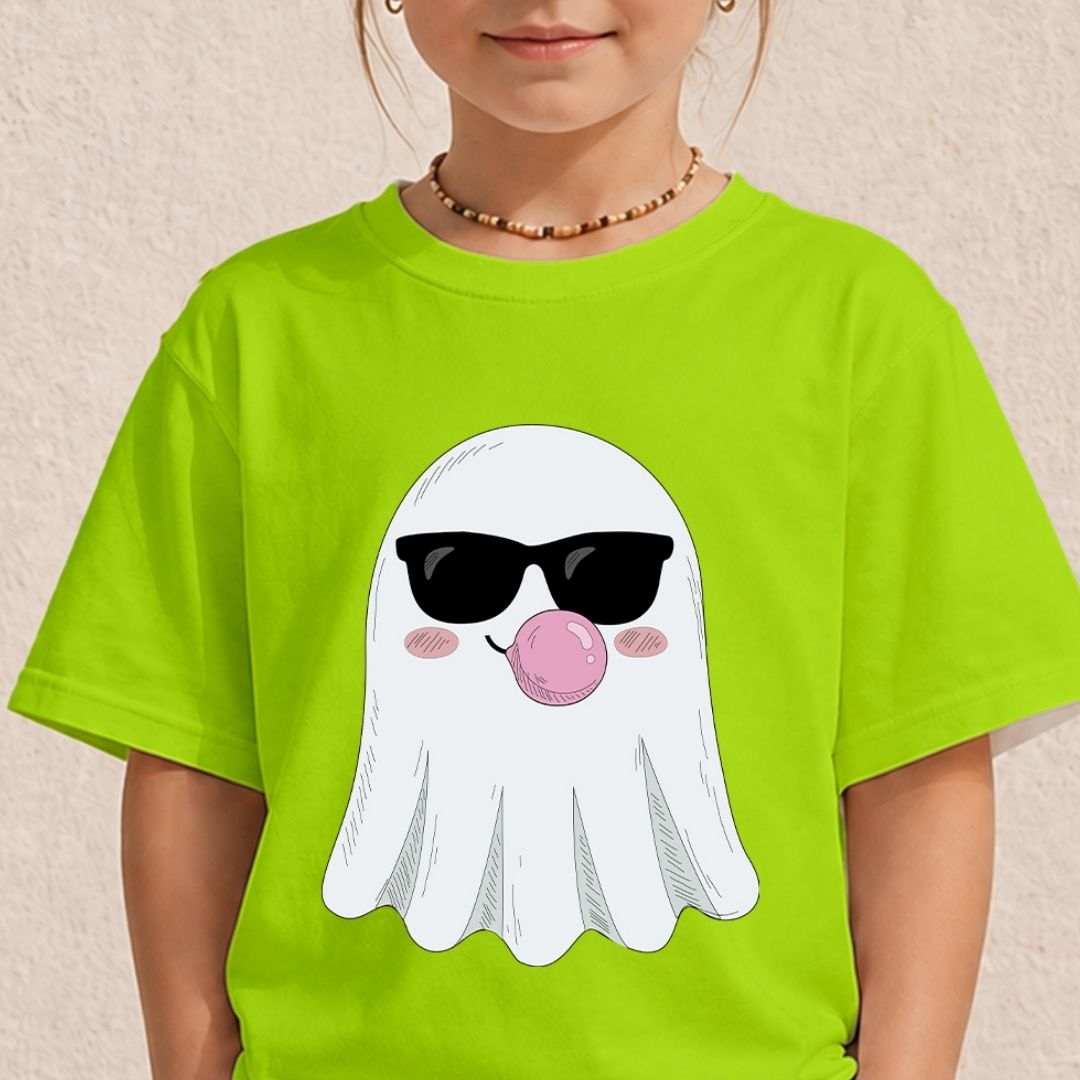 A child wearing a bright lime green t-shirt with a cartoon graphic of a white ghost wearing black sunglasses and blowing a pink bubblegum bubble.