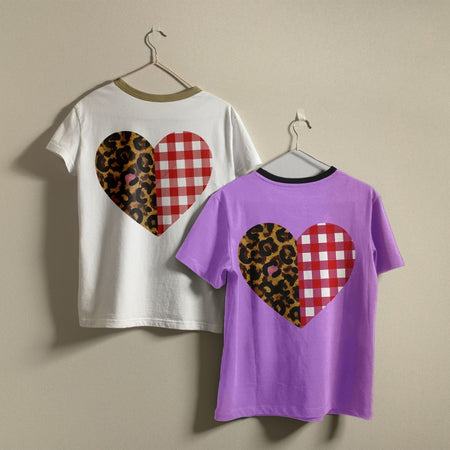 Split Pattern Heart Graphic Shirts on Hangers in White and Purple