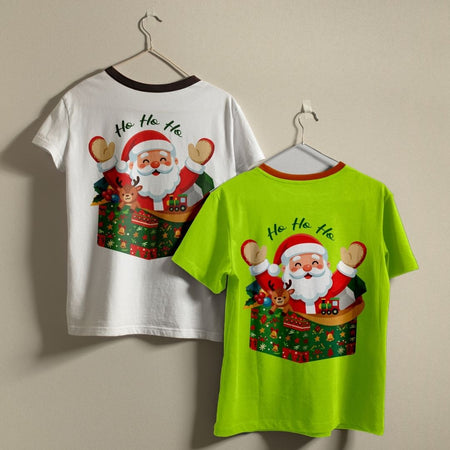 Two Christmas-themed t-shirts hanging on hangers against a plain beige wall. The left shirt is white with a dark brown collar and features a large graphic of Santa Claus on the back.