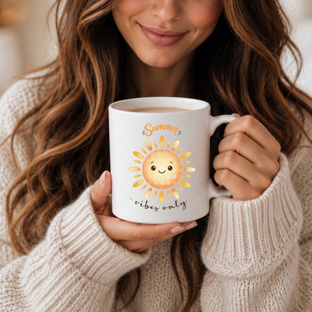 A woman with long brown hair holding a white ceramic mug featuring a happy cartoon sun graphic and the text "Summer vibes only".