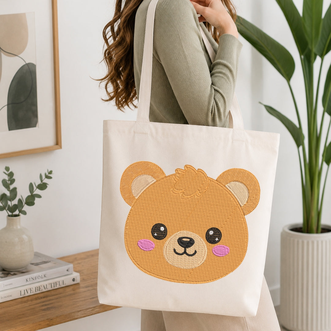 Person holding a tote bag with a bear design in a home setting