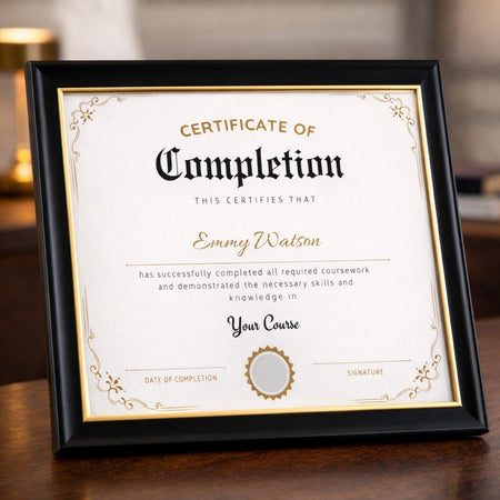 Framed certificate of completion with decorative border on a wooden surface
