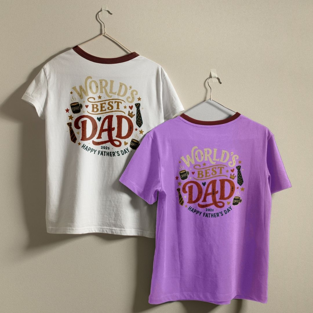White and purple t-shirts with 'World's Best Dad' text on hangers against a beige background