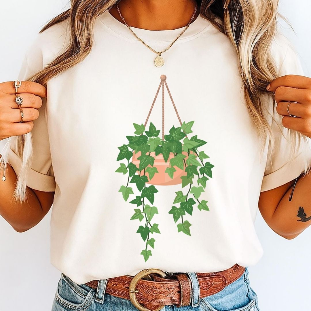 Beige t-shirt mockup showcasing a hanging potted ivy plant digital illustration.