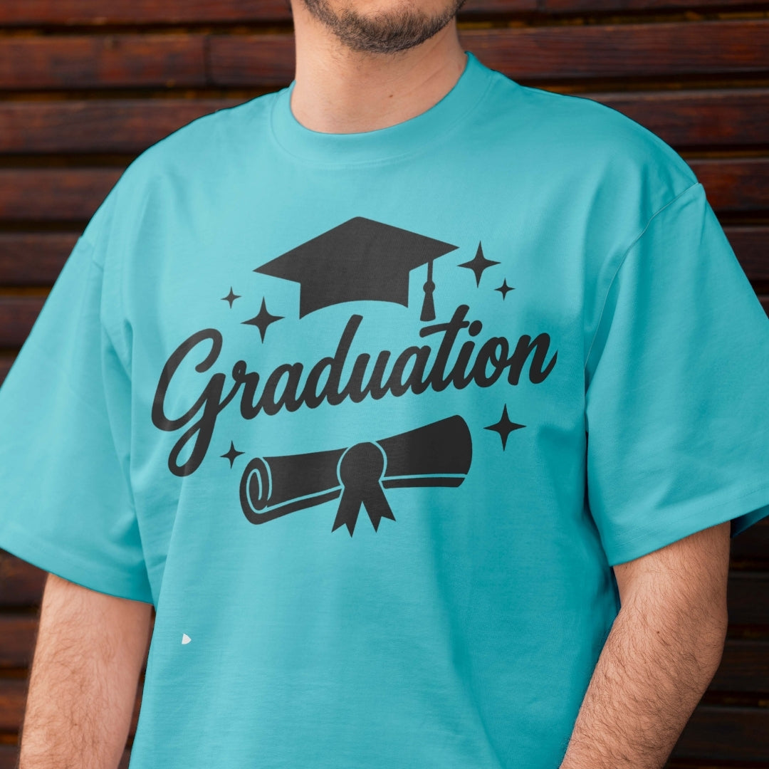 Person wearing a turquoise t-shirt with 'Graduation' and graduation cap design.