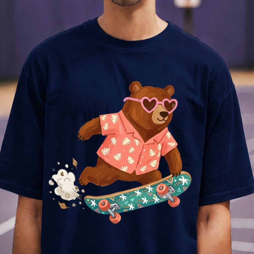 Person wearing a navy blue t-shirt with a bear graphic on a skateboard