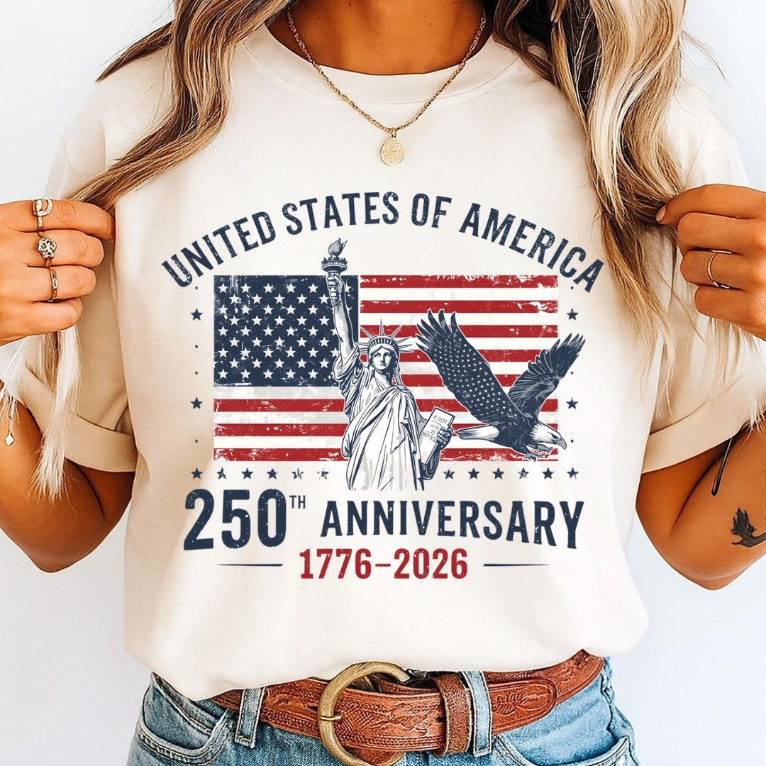 Person wearing a t-shirt celebrating the 250th anniversary of the United States of America with an American flag and eagle design.