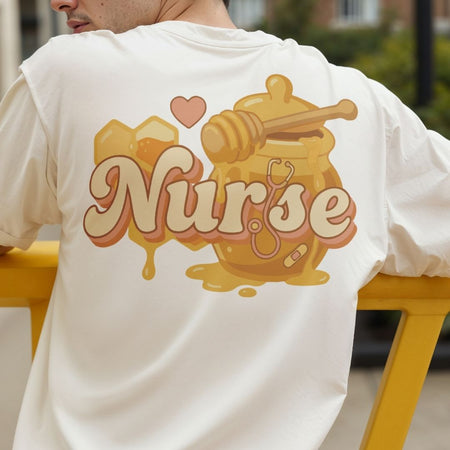 Person wearing a white t-shirt with a 'Nurse' design on the back.