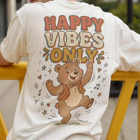 Person wearing a t-shirt with a bear graphic and 'Happy Vibes Only' text.