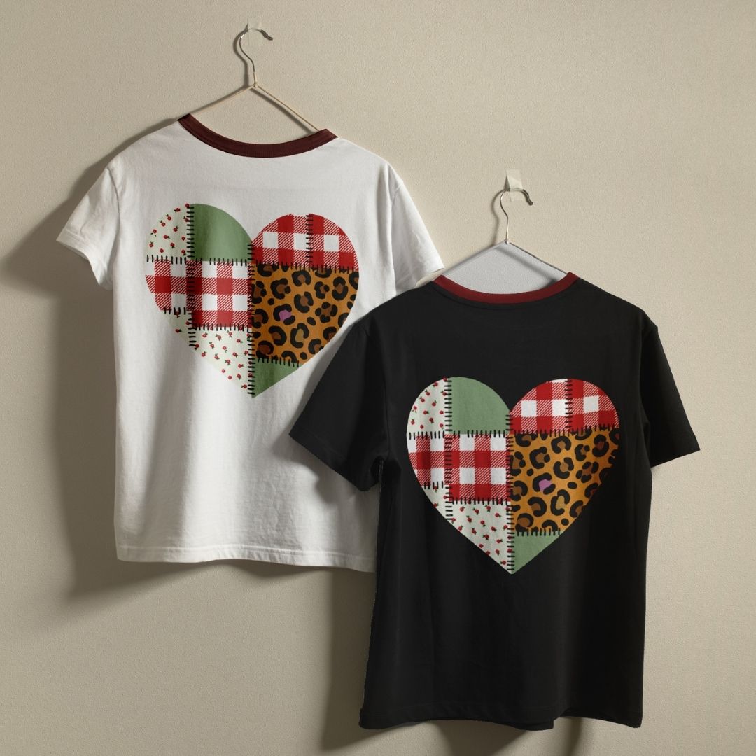 Two t-shirts with heart-shaped pattern on a beige background