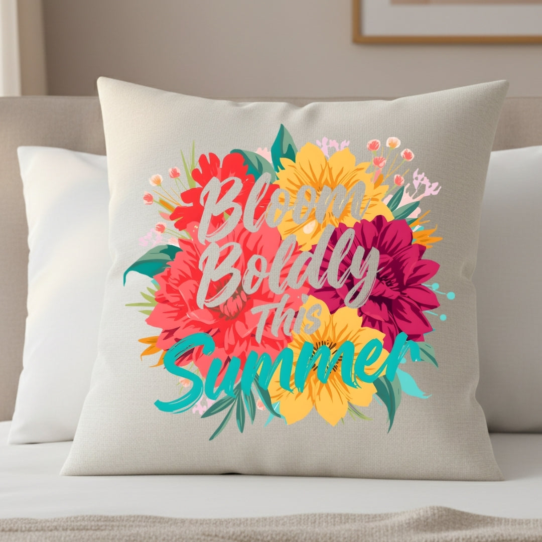 Decorative pillow with floral design and text on a couch
