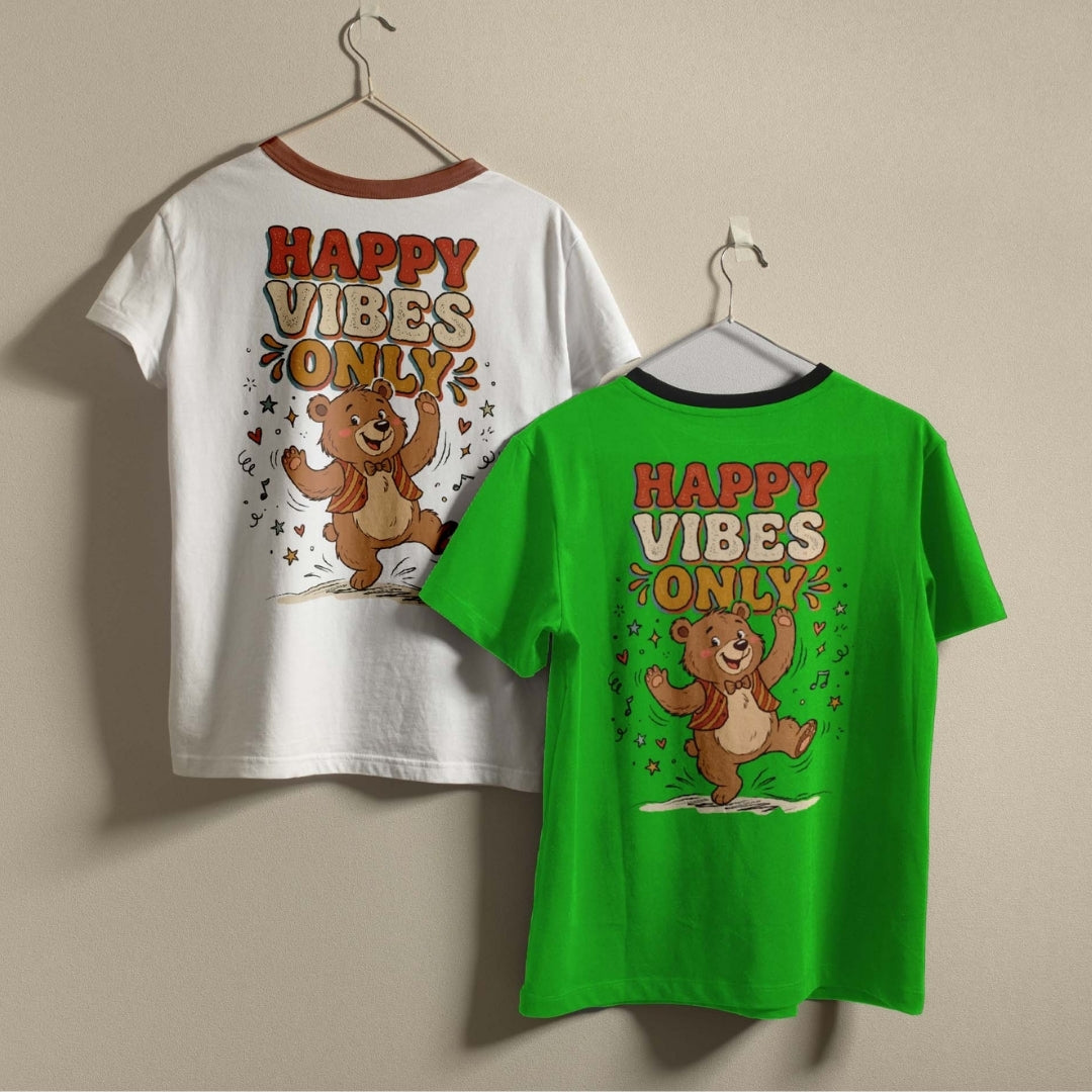 Two t-shirts with a bear graphic and 'Happy Vibes Only' text on a beige background.