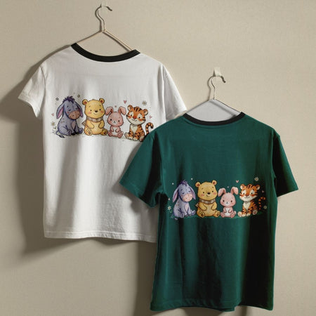Two t-shirts, one white and one green, with cartoon animal characters on a beige background.