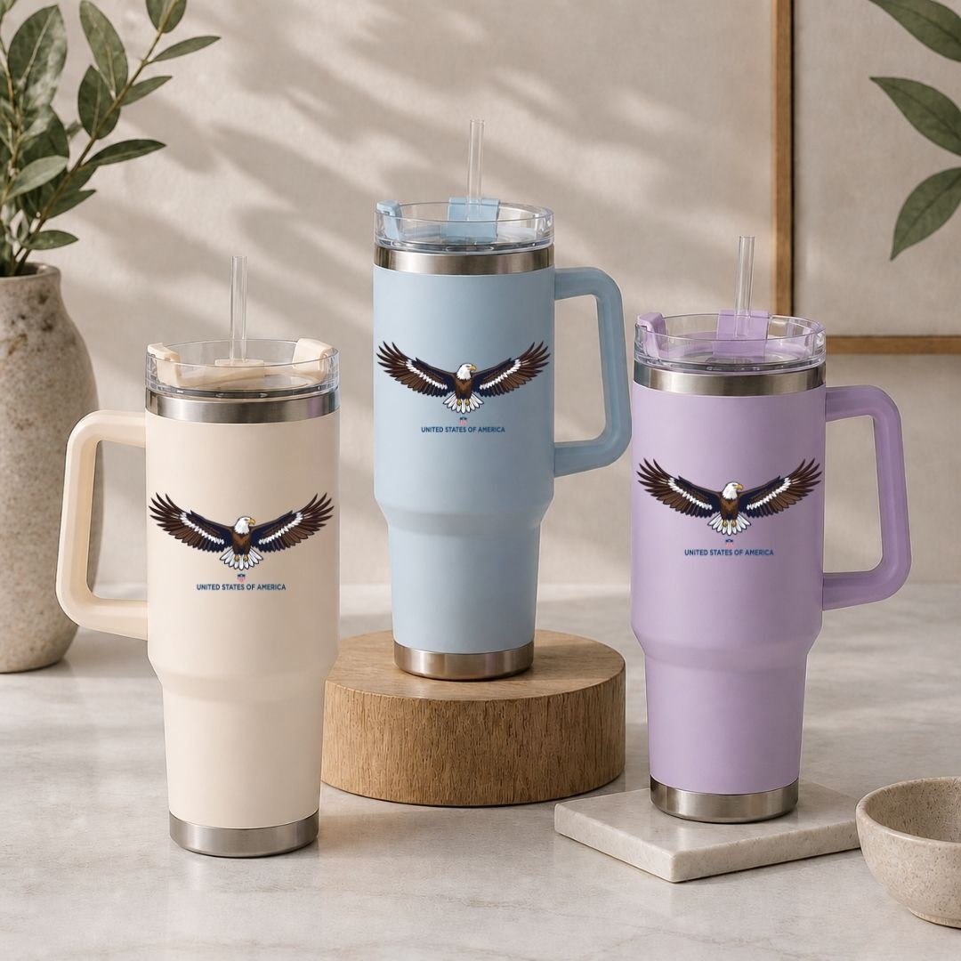 Three insulated mugs with humorous designs and text on a neutral background