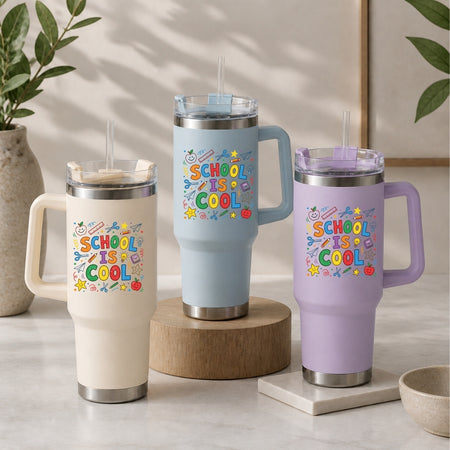 Three insulated travel mugs with 'School is Cool' design on a neutral background