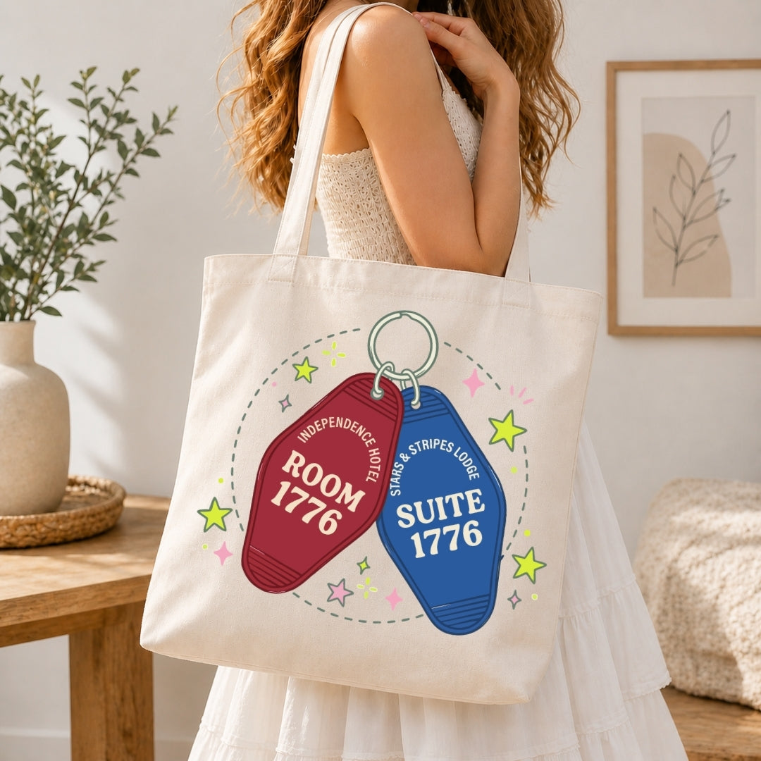 Person holding a tote bag with room and suite numbers on it in a home setting.