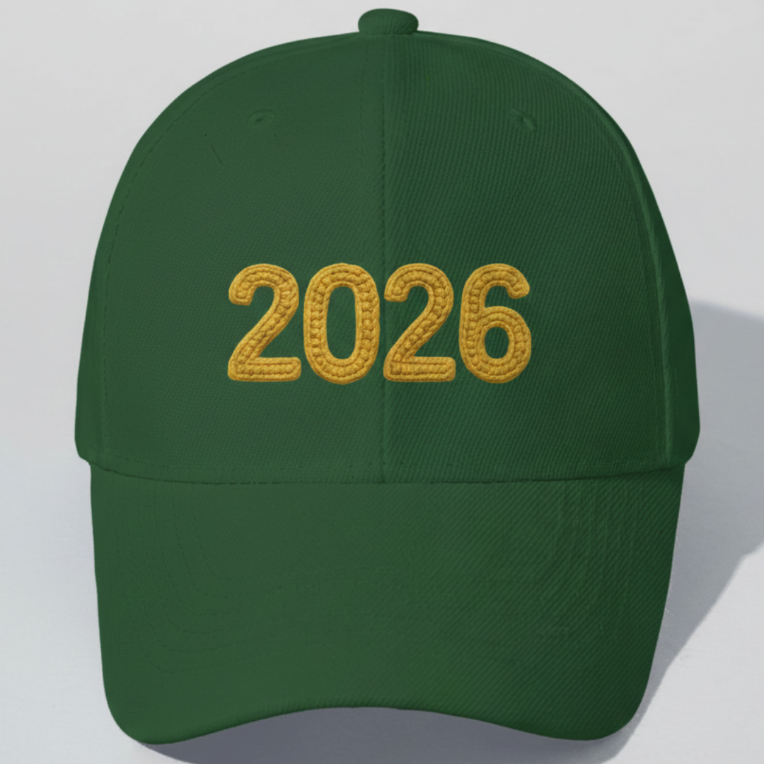 Green cap with '2026' embroidered in yellow on a light gray background