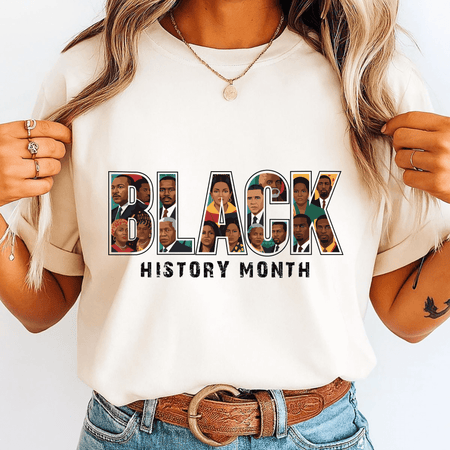 Person wearing a white t-shirt with 'BLACK HISTORY MONTH' design featuring various faces.