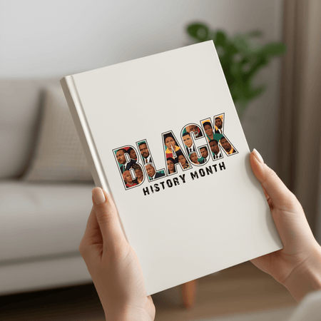 Book with 'Black History Month' design held by hands in a home setting
