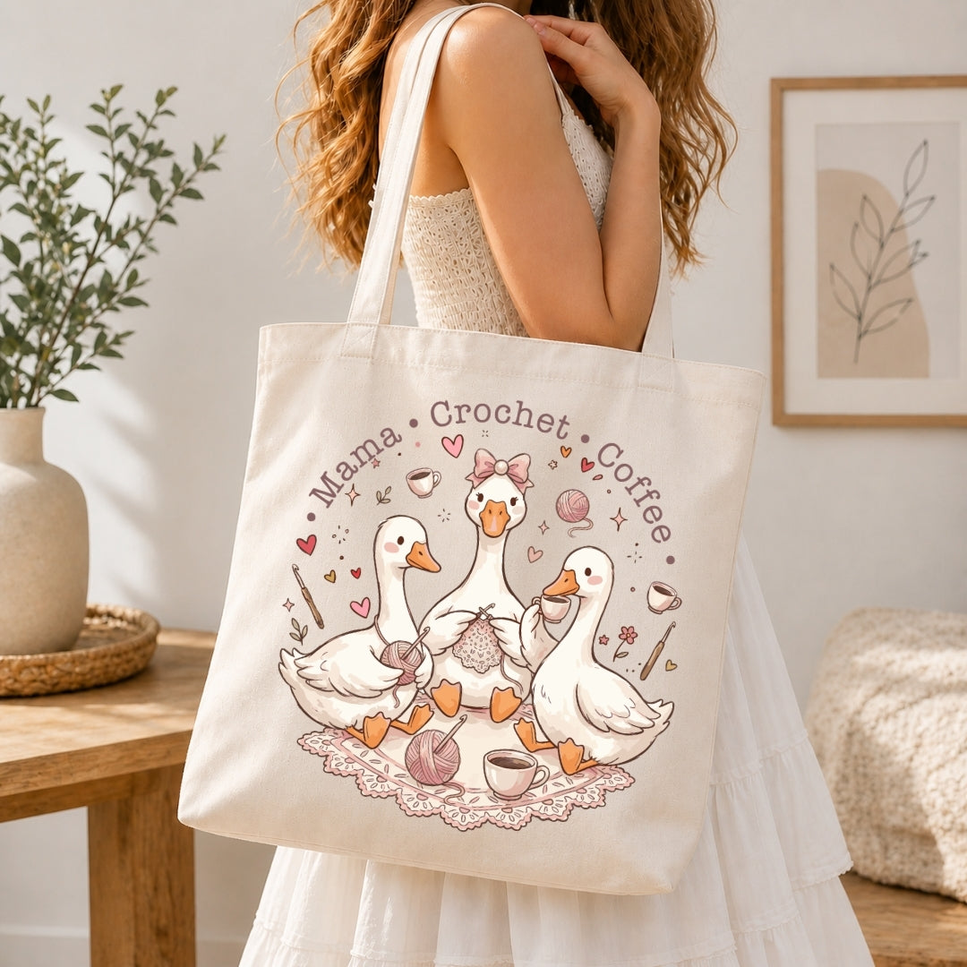 Person holding a tote bag with a design of ducks and text in a home setting