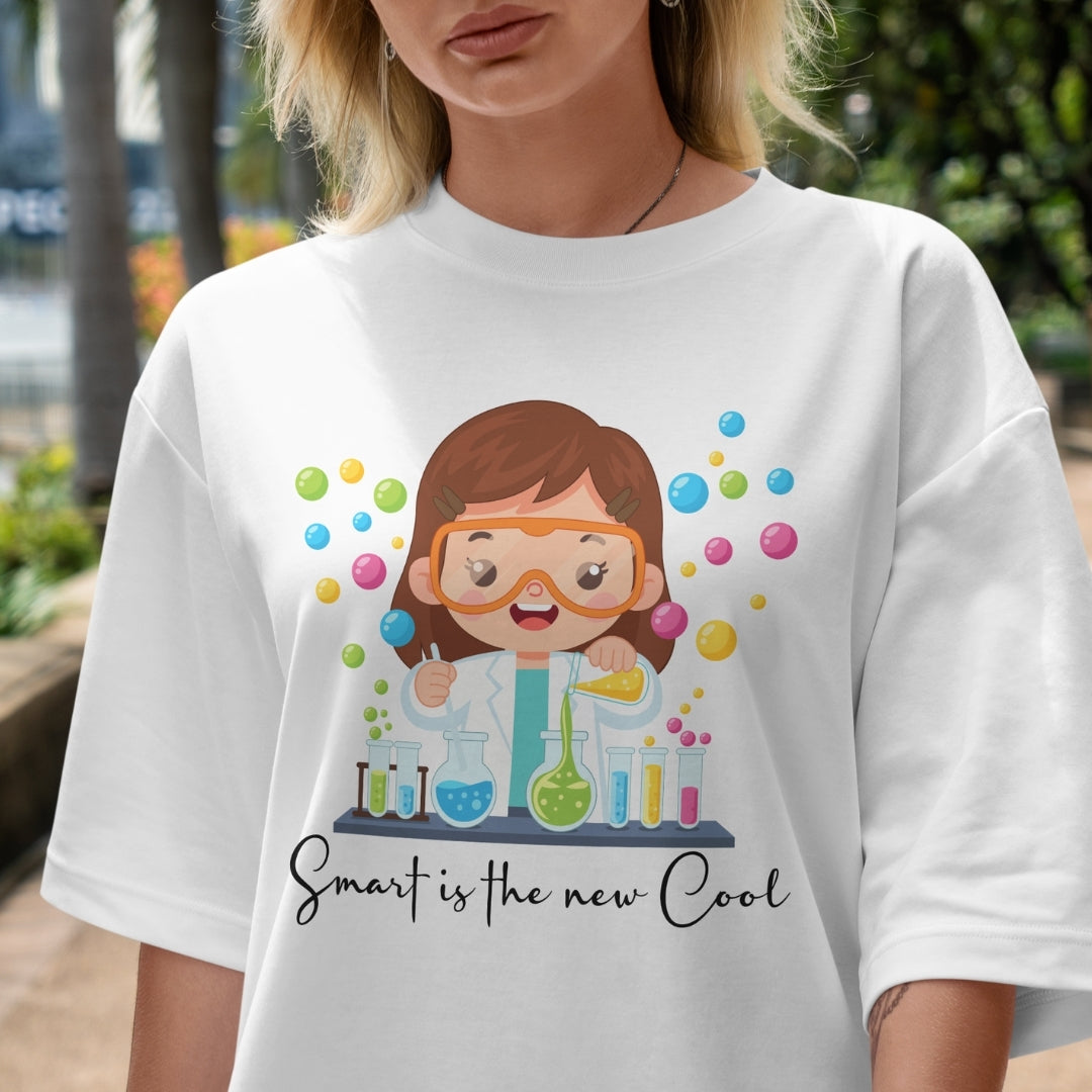 Person wearing a white t-shirt with a colorful graphic and text 'Smart is the new Cool'.