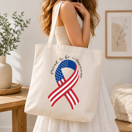 Tote bag with American flag design held by a person in a home setting