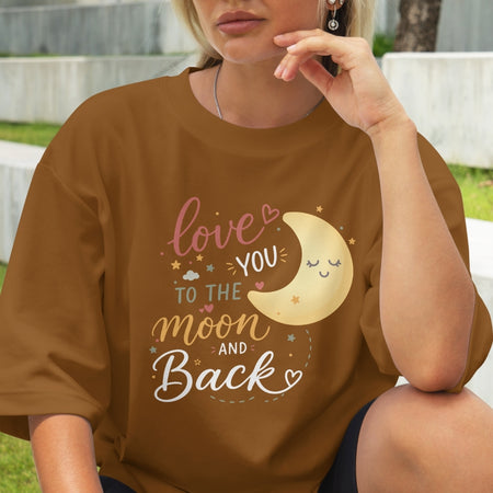 Person wearing a brown t-shirt with 'love you to the moon and back' text and graphic.